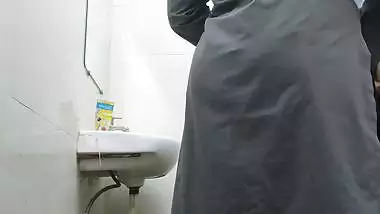 Wife in abroad fucked by office manager in washroom